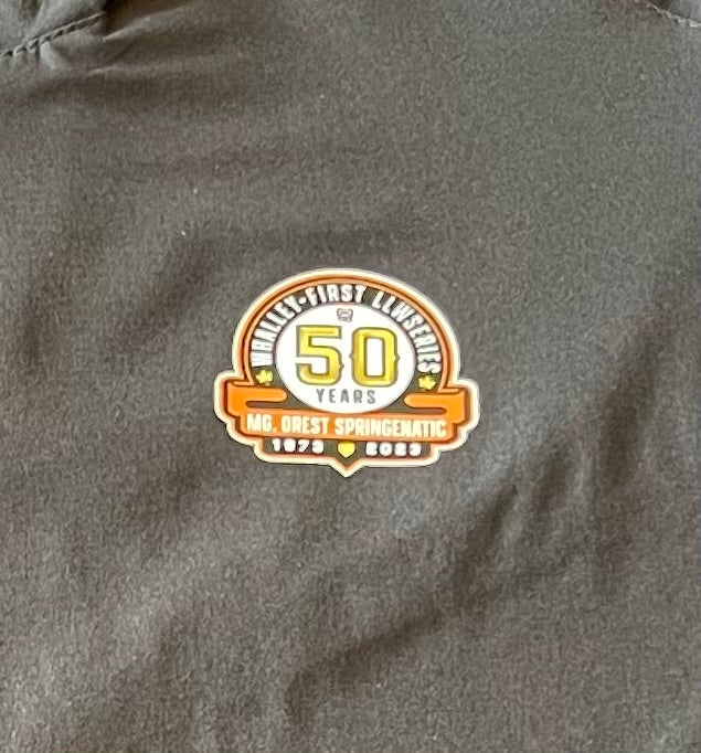 Black and Orange Cage Shirt with  WLL  50 year Logo